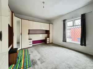 Bedroom One- click for photo gallery
